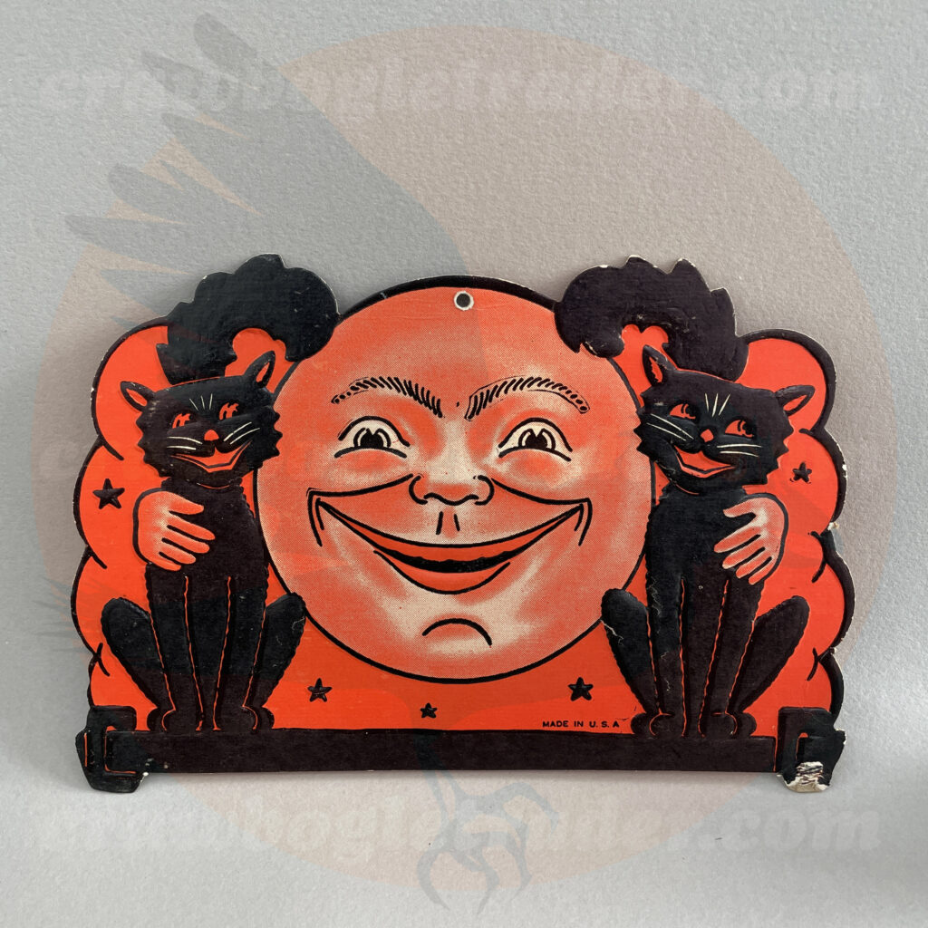 Two sitting black cats on fence hugged by the main in the moon - a Beistle embossed paper vintage Halloween collectible offered by trade/buy/sell Craw-Bogle Trader collector, a companion site to The Halloween Retrospect archive library.