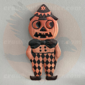 Jack O'Lantern man with star cap and diamond pants and bowtie - a German pressed paper diecut import of antique-vintage era Halloween collectibles offered by trade from Craw-Bogle Trader collection, a companion site to The Halloween Retrospect archive library. (Note buy-sell may be considered upon contacting site with questions).