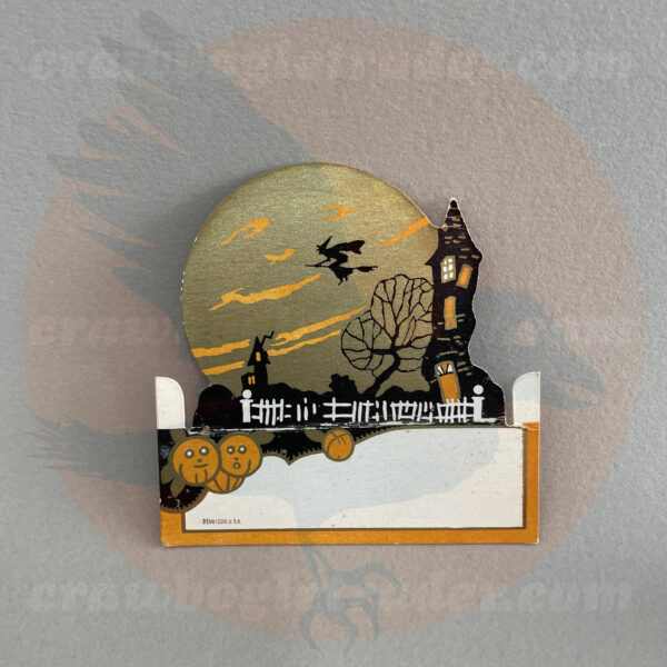 Witch flying over moon and clouds near a haunted house and pumpkin patch with picket fence is a placecard - a Dennison vintage Halloween collectible offered by trade/buy/sell Craw-Bogle Trader collector, a companion site to The Halloween Retrospect archive library.