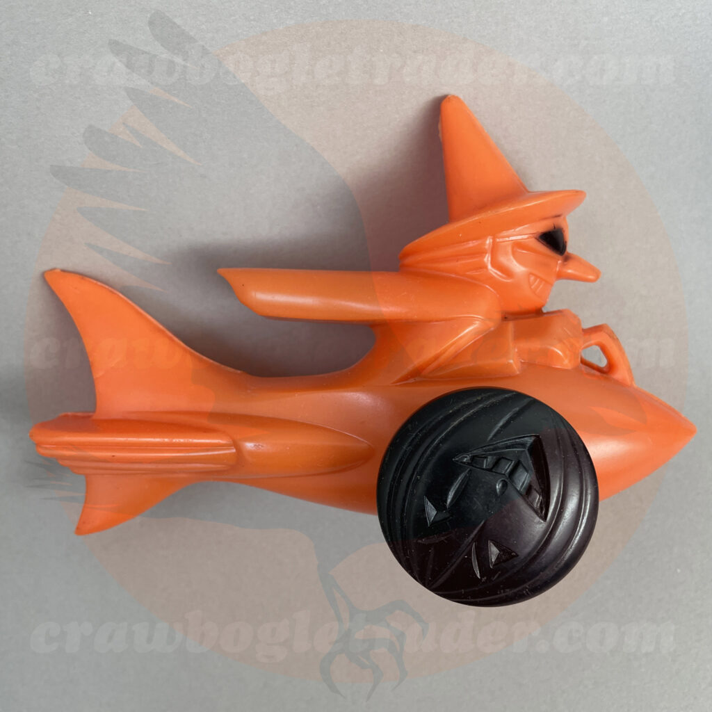 Vintage Halloween plastic collectibles by Rosen aka Rosbro of orange-color goggle witch on rocket car with jack o'lantern wheels in black - offered by trade/buy/sell Craw-Bogle Trader collector, a companion site to The Halloween Retrospect archive library.