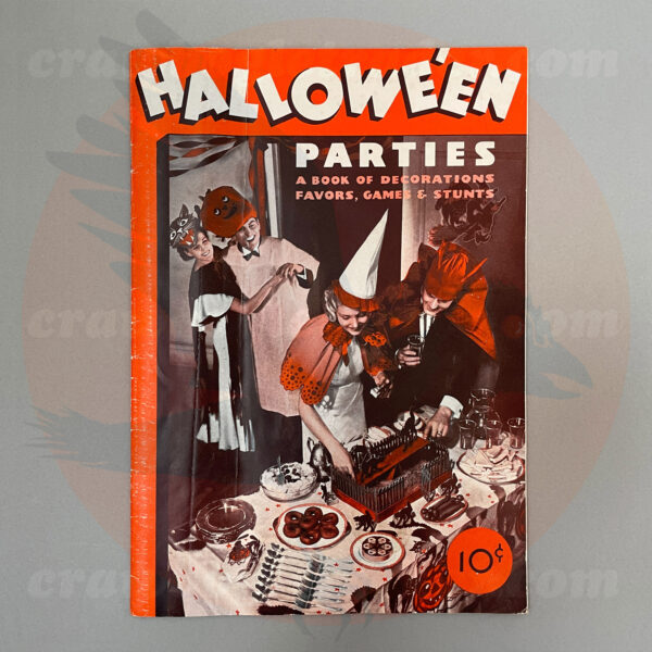 Front cover - Dennison 1934 Halloween Parties vintage Halloween collectibles guidebook with photo of adults in costume at the table - offered by trade/buy/sell Craw-Bogle Trader collector, a companion site to The Halloween Retrospect archive library.