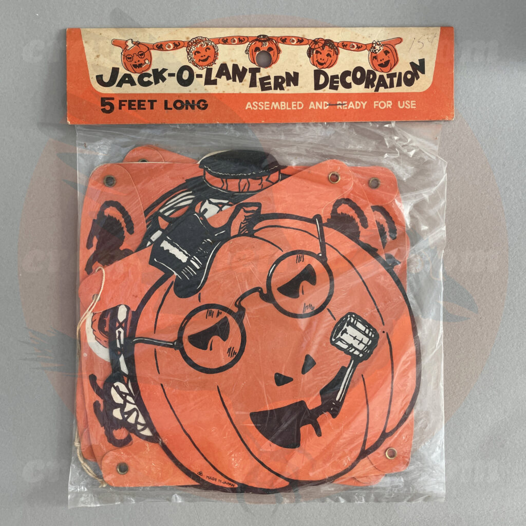 Jack O'Lantern Decoration garland with male and female pumpkin faces from mid-century - a Beistle diecut paper vintage Halloween collectible offered by trade/buy/sell Craw-Bogle Trader collector, a companion site to The Halloween Retrospect archive library.