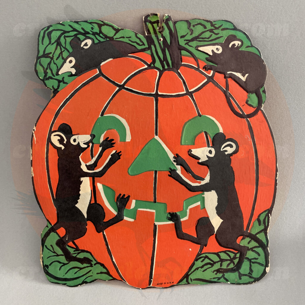 Green and black jack o'lantern in a pumpkin patch and covered in black mice - a Beistle embossed diecut paper vintage Halloween collectible offered by trade/buy/sell Craw-Bogle Trader collector, a companion site to The Halloween Retrospect archive library.