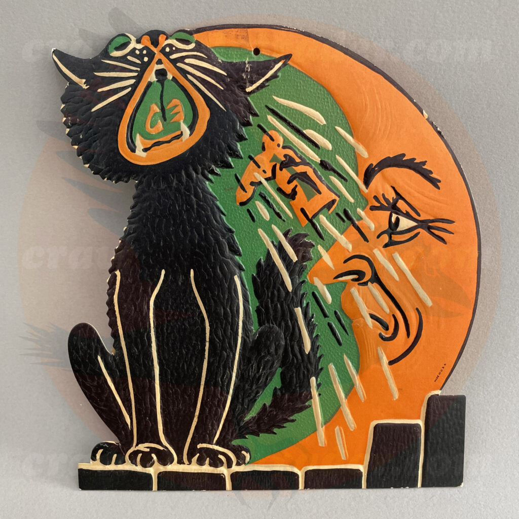 Black cat singing under the man in the moon and getting a boot in the face - a Beistle embossed diecut paper vintage Halloween collectible offered by trade/buy/sell Craw-Bogle Trader collector, a companion site to The Halloween Retrospect archive library.