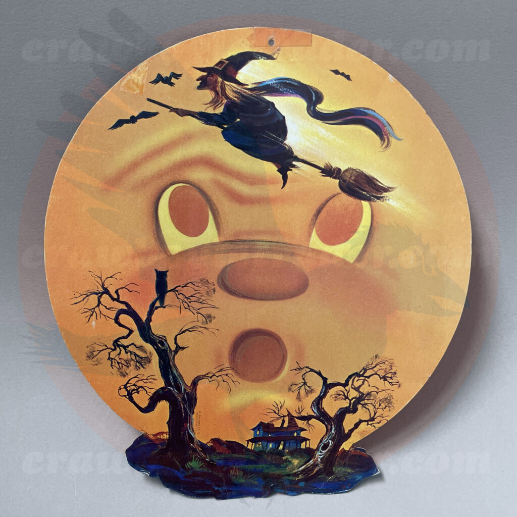 Classic vintage Halloween decoration of surprised full moon passed by a flying witch on a broom with bats above a haunted house with two old trees including a perched owl - is one item from the collection of Craw Bogle Trader up for trader (with consideration of buy and sell options also available under certain circumstances). Please contact us.