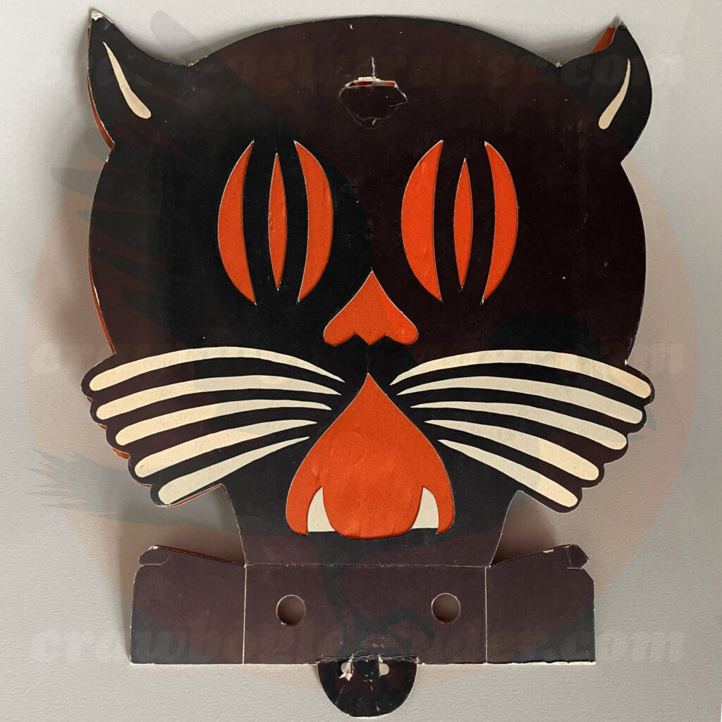 Side Two - Deco-style orange and black owl diecut called Tommy Whiskers is a classic vintage Halloween lantern by Beistle and glows when folded out so light placed behind the tissue paper shines. This lantern is featured in The Halloween Retrospects full-color guidebook of vintage collectibles Halloween Artifacts, Volume 1: Lighting. The item itself is available for-trade from Craw-Bogle Trader (while buying and selling of vintage Halloween collections is also considered and please contact the online shop for details).