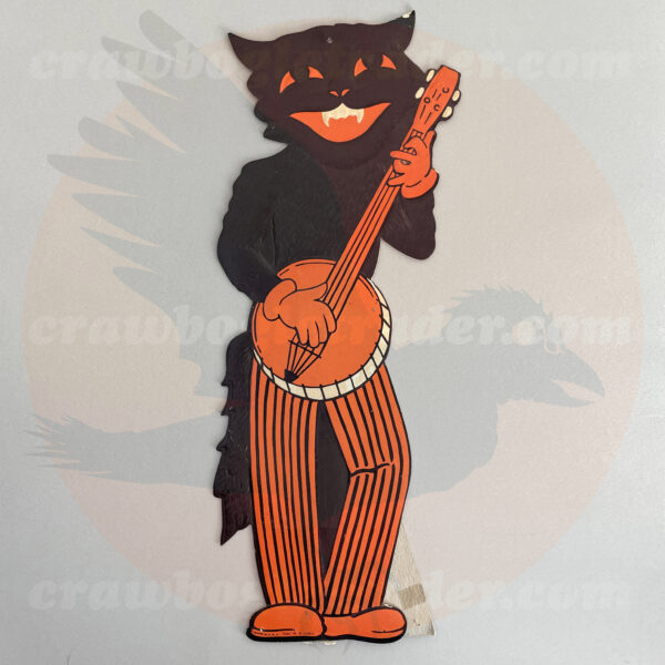 Second vintage Halloween mid-century era of Americana black-cat banjo player musician is a classic Beistle decoration measuring 20-inch height which is for-trade basis from Craw Bogle Trader (noting also that buy and sell options of vintage Halloween collectibles are considered upon contacting online shop with further details).