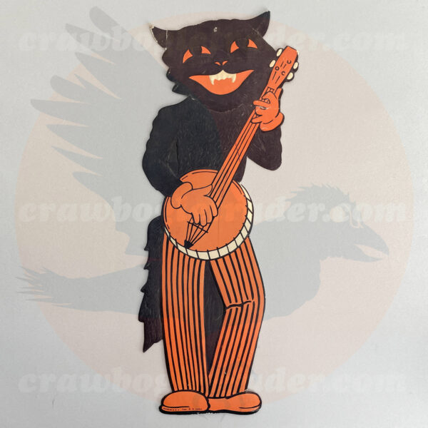 First vintage Halloween mid-century era of Americana black-cat banjo player musician is a classic Beistle decoration measuring 20-inch height which is for-trade basis from Craw Bogle Trader (noting also that buy and sell options of vintage Halloween collectibles are considered upon contacting online shop with further details).