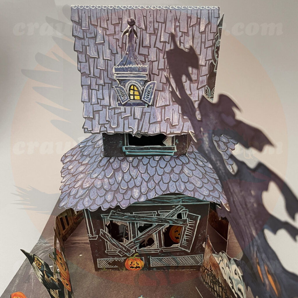 Top detail view (roof, big tree, witch, jack o'lantern) of 1960's Hallmark pop-up haunted house table centerpiece vintage Halloween decoration - an item for trade from Craw Bogle Trader (noting that buying and selling may be considered upon contacting the website).